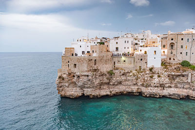 Polignano a mare. town on the cliffs, puglia region, italy, europe. traveling concept background