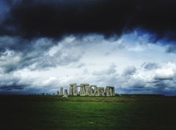 Built structure against cloudy sky