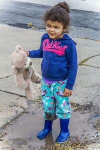 Cute girl standing outdoors