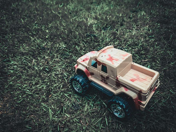 High angle view of toy car on field