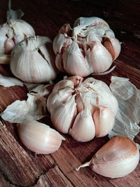 High angle view of garlic bulbs on table