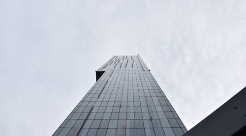 Low angle view of modern building against sky