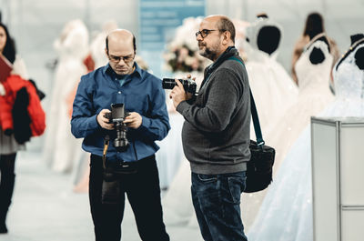 Group of people photographing