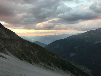 Scenic view of mountains against sky during sunset