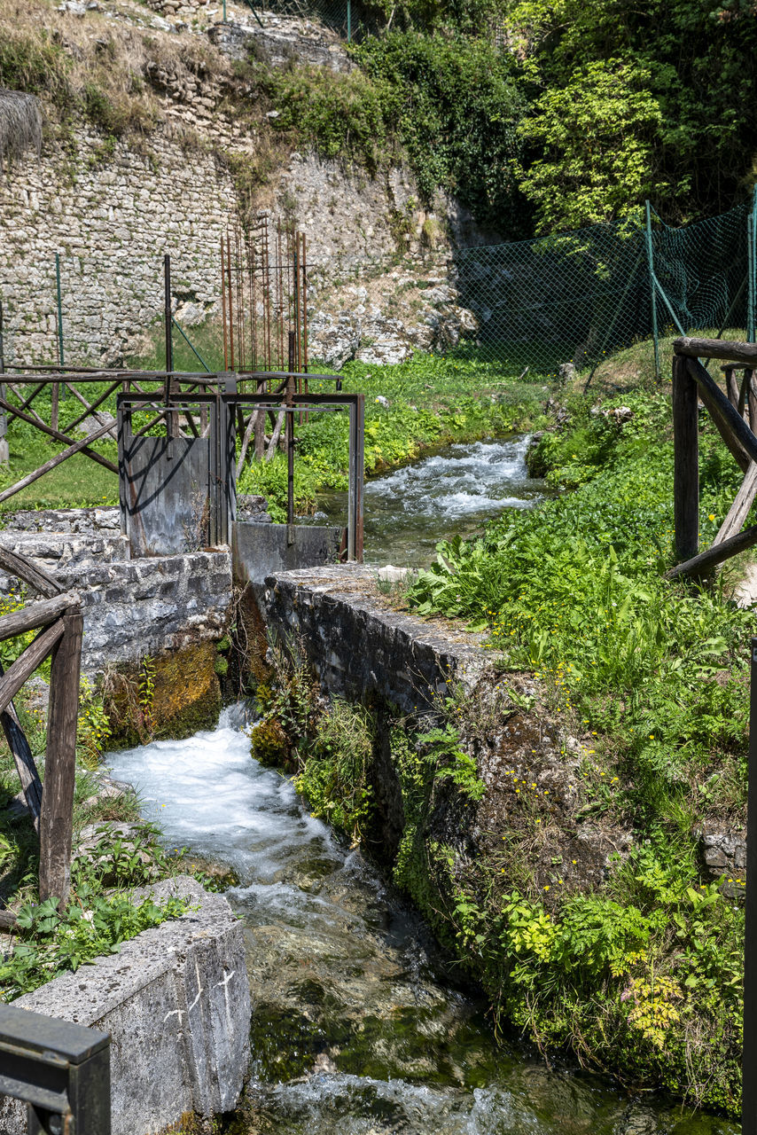 plant, water, nature, no people, architecture, stream, built structure, tree, day, rock, river, railing, beauty in nature, land, outdoors, growth, waterway, staircase, waterfall, green, tranquility, bridge, scenics - nature, flowing water, forest, water feature, garden, footbridge, environment, tranquil scene