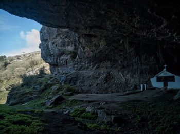 Rock formations on mountain against sky
