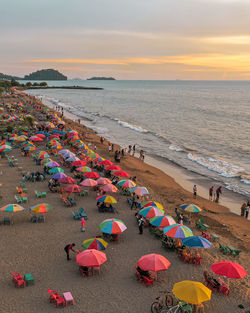 High angle view of people at beach during sunset, padang beach