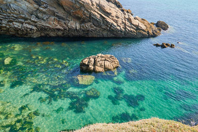 Clear sea on the wild coast of quiberon the rocky coast on the atlantic