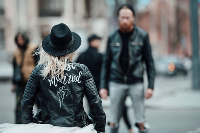 People walking on street in city