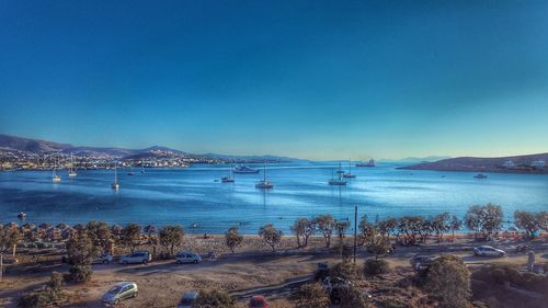 Scenic view of sea against clear blue sky