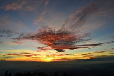 Low angle view of dramatic sky during sunset