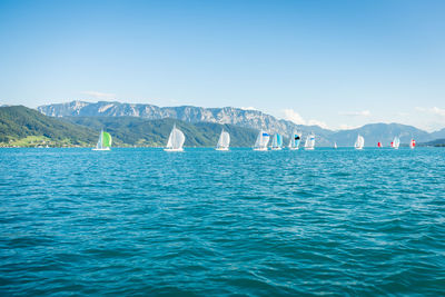 Scenic view of sea against clear blue sky