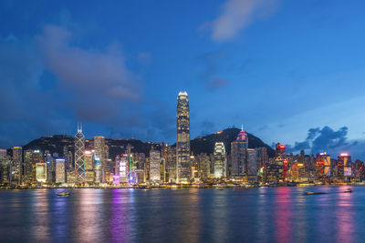 Scenic view of hong kong skyline illuminated at night