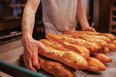 Organic bakery - details of baking baguette bread