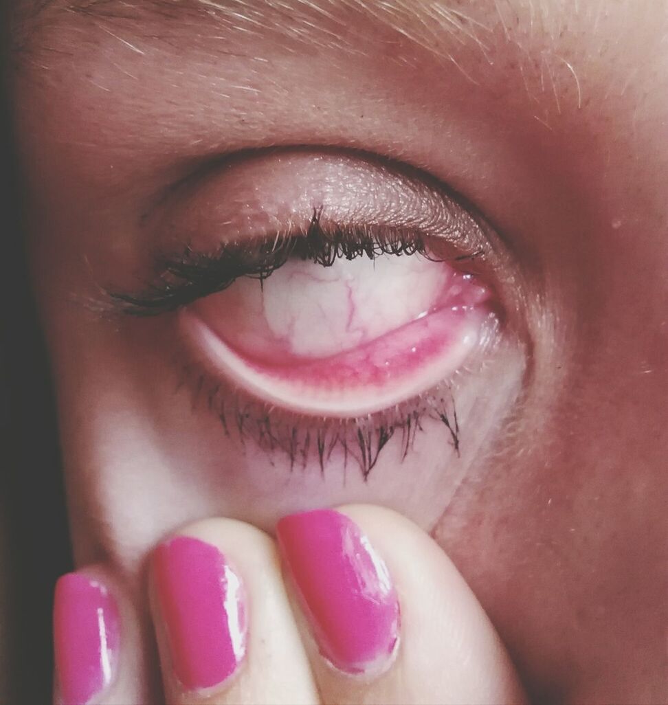 part of, close-up, pink color, person, lifestyles, cropped, red, unrecognizable person, human eye, human face, human finger, freshness, human skin, indoors, leisure activity, extreme close up