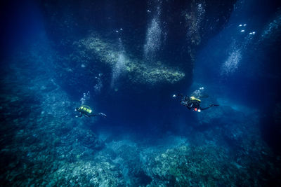 High angle view of man surfing in sea