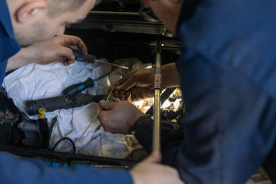 Midsection of man working at clinic