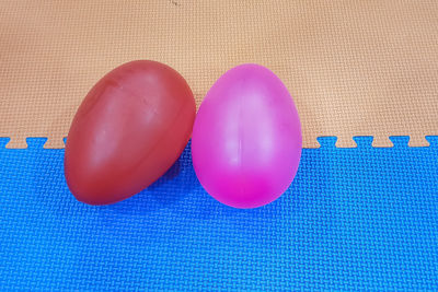 High angle view of multi colored balloons on table