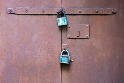 Close-up of padlock on door