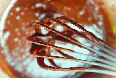 Close-up of liquid chocolate in mixing bowl