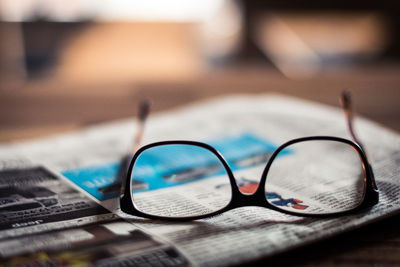 Close-up of sunglasses on table