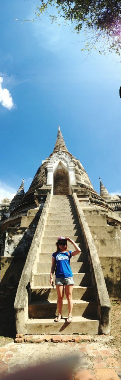 architecture, built structure, lifestyles, building exterior, leisure activity, full length, casual clothing, rear view, steps, person, men, standing, religion, sky, place of worship, low angle view, walking, steps and staircases