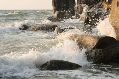 Waves splashing on rocks