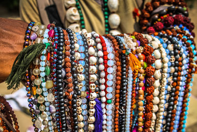 Close-up of multi colored jewelry for sale