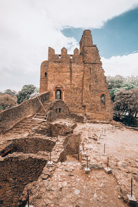 Low angle view of historic building against sky