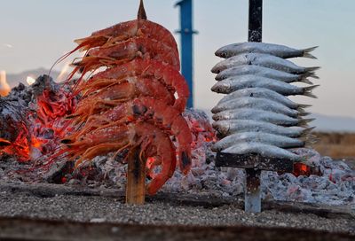 Seafood skewers by fire