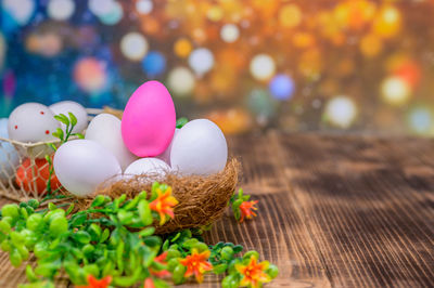 Close-up of multi colored eggs on table
