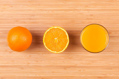 Directly above shot of orange fruits on table