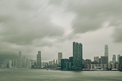 Modern buildings in city against sky