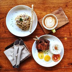 High angle view of breakfast served on table