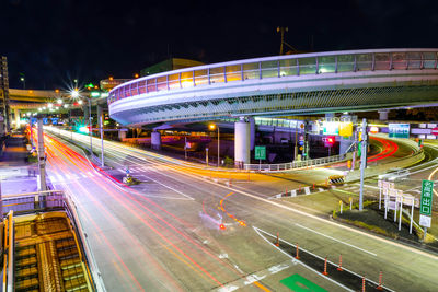 High angle view of light trails on road at night