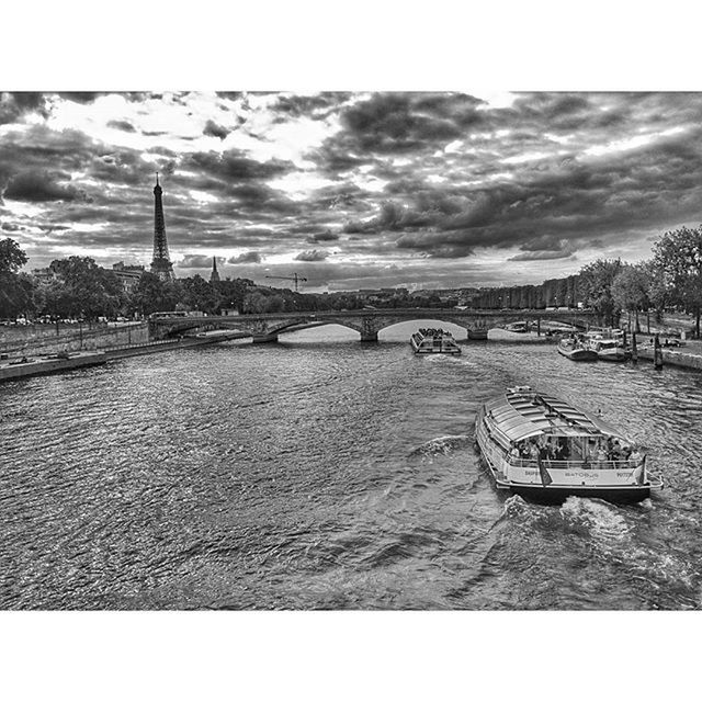 sky, transfer print, cloud - sky, auto post production filter, cloudy, transportation, built structure, overcast, cloud, weather, water, architecture, outdoors, mode of transport, bench, nature, building exterior, empty, incidental people, road