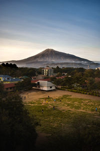 Scenic view of residential district against sky