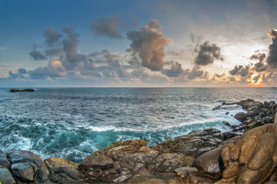 Scenic view of sea against sky during sunset