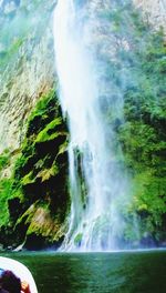 Close-up of waterfall against sea