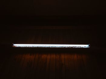 High angle view of illuminated lamp on table