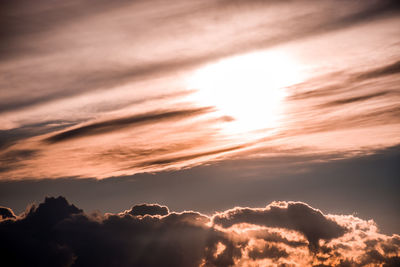 Low angle view of dramatic sky during sunset