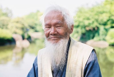 Portrait of man against blurred background