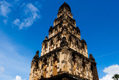 Low angle view of historical building against blue sky