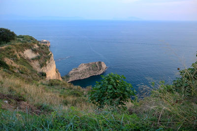 High angle view of sea shore against sky