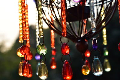 Close-up of illuminated decorations hanging