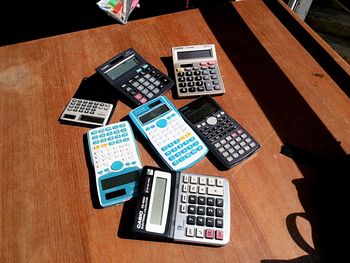 High angle view of calculators on table