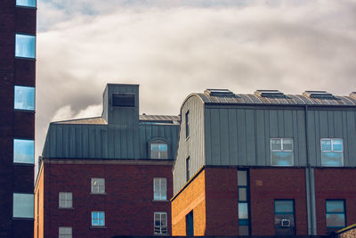 Low angle view of buildings against sky