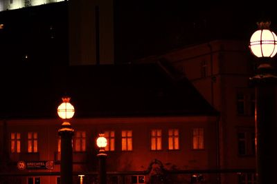 Low angle view of illuminated building at night