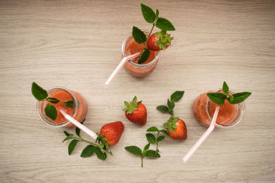 Top view of glass glasses with strawberry smoothie