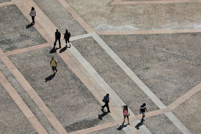 High angle view of people walking on street